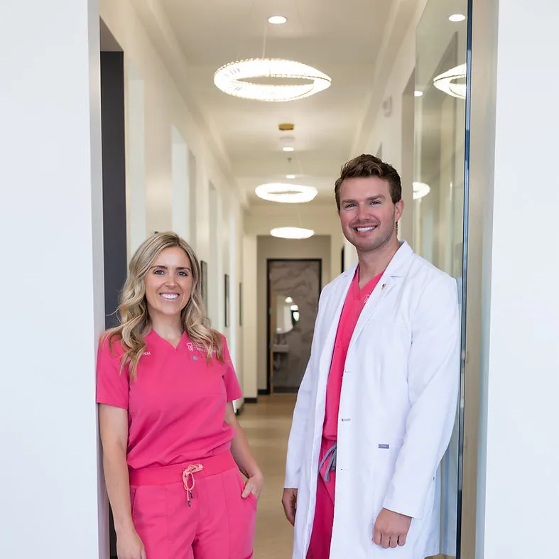 Dr. Bringhurst and Katelin in the office hallway